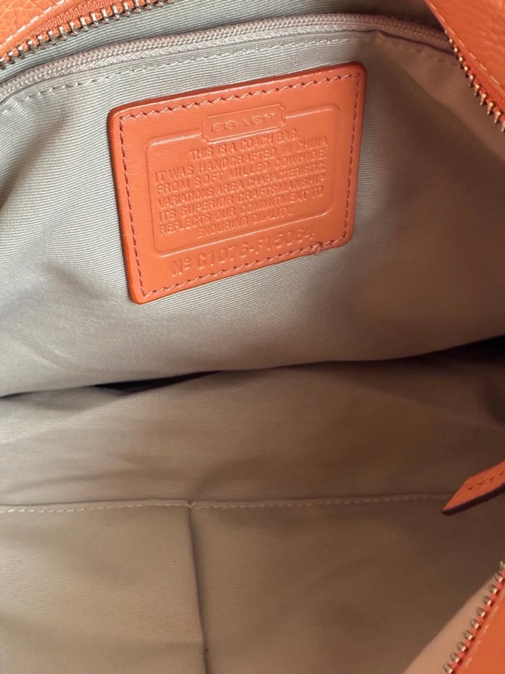 Coach Pebbled Leather Crossbody Bag in Orange